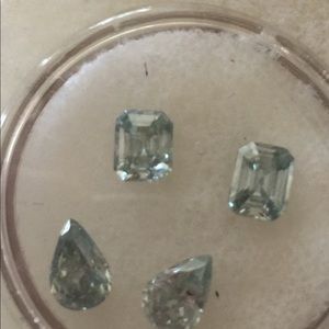 Emerald, Pear cut Mossinites quarter carat each